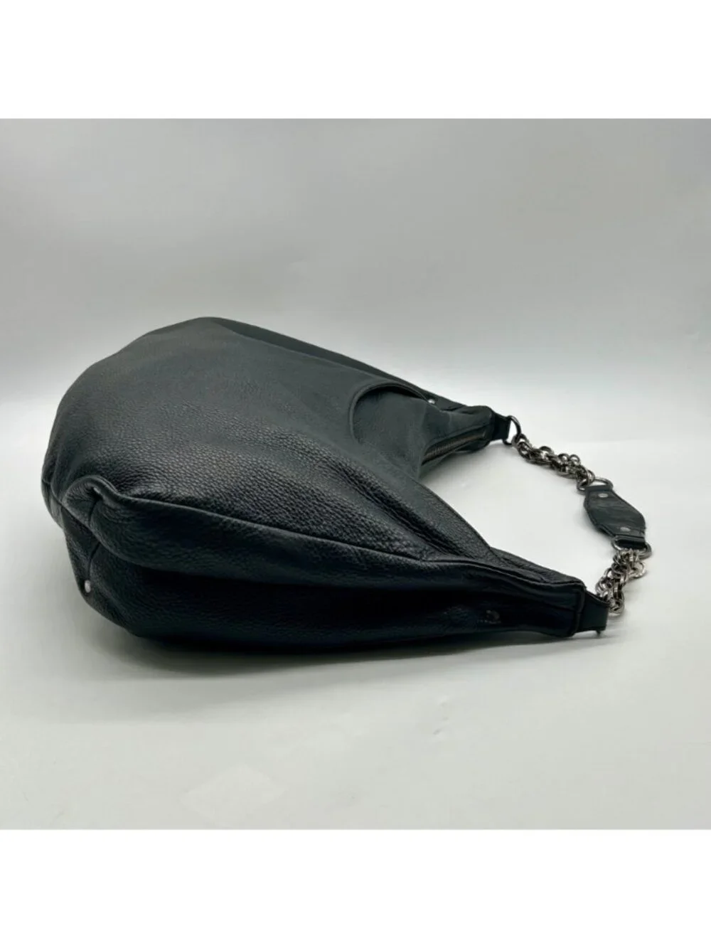 Kenneth Cole chic versatile